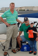 Cancer patient Jesse Heaton with his father Jesse Snr and Gale Tynefield, Chief Executive of Angel Flight South Central who is on the pilots' roster.