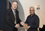 Eric Fullerton, Chief Sales & Marketing Officer at Milestone Systems presents Milestone Manufacturer Alliance Partner of the Year Award 08 to Yash Patel, Executive Director, CCTV Europe at JVC Professional Europe Ltd.