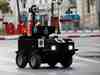 The police robot, “P-Guard,” originally invented for security patrols of sensitive open areas, is now being used to help enforce lockdown rules.