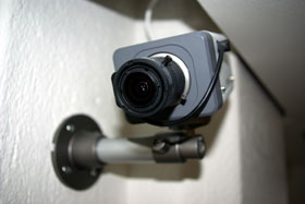 A PoE enabled IP security camera is an example of a powered device (PD) equipped to accept low voltage power transmitted over Ethernet cabling.