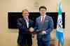John N. Stewart, Senior Vice President and Chief Security and Trust Officer, Cisco, and Noboru Nakatani, Executive Director, Interpol Global Complex for Innovation (IGCI), sign collaboration agreement to combat cyber crime.